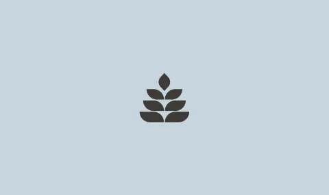 A graphic of a brown tree with 7 leaves on a blue coloured background.