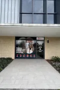 Entrance to the Shoalhaven Veteran and Family Hub with signage and a pathway leading to the front doors.