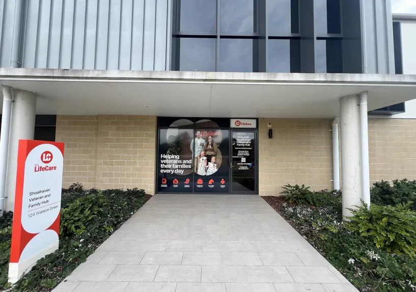 Entrance to the Shoalhaven Veteran and Family Hub with signage and a pathway leading to the front doors.