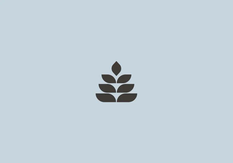 A graphic of a brown tree with 7 leaves on a blue coloured background.